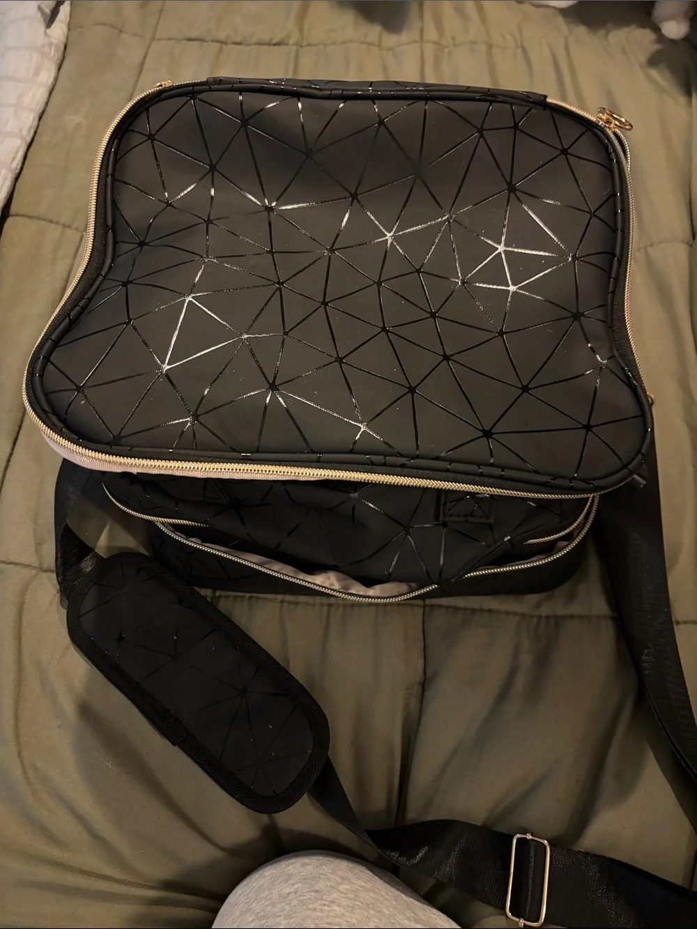 Black geometric nail polish and accessory bag